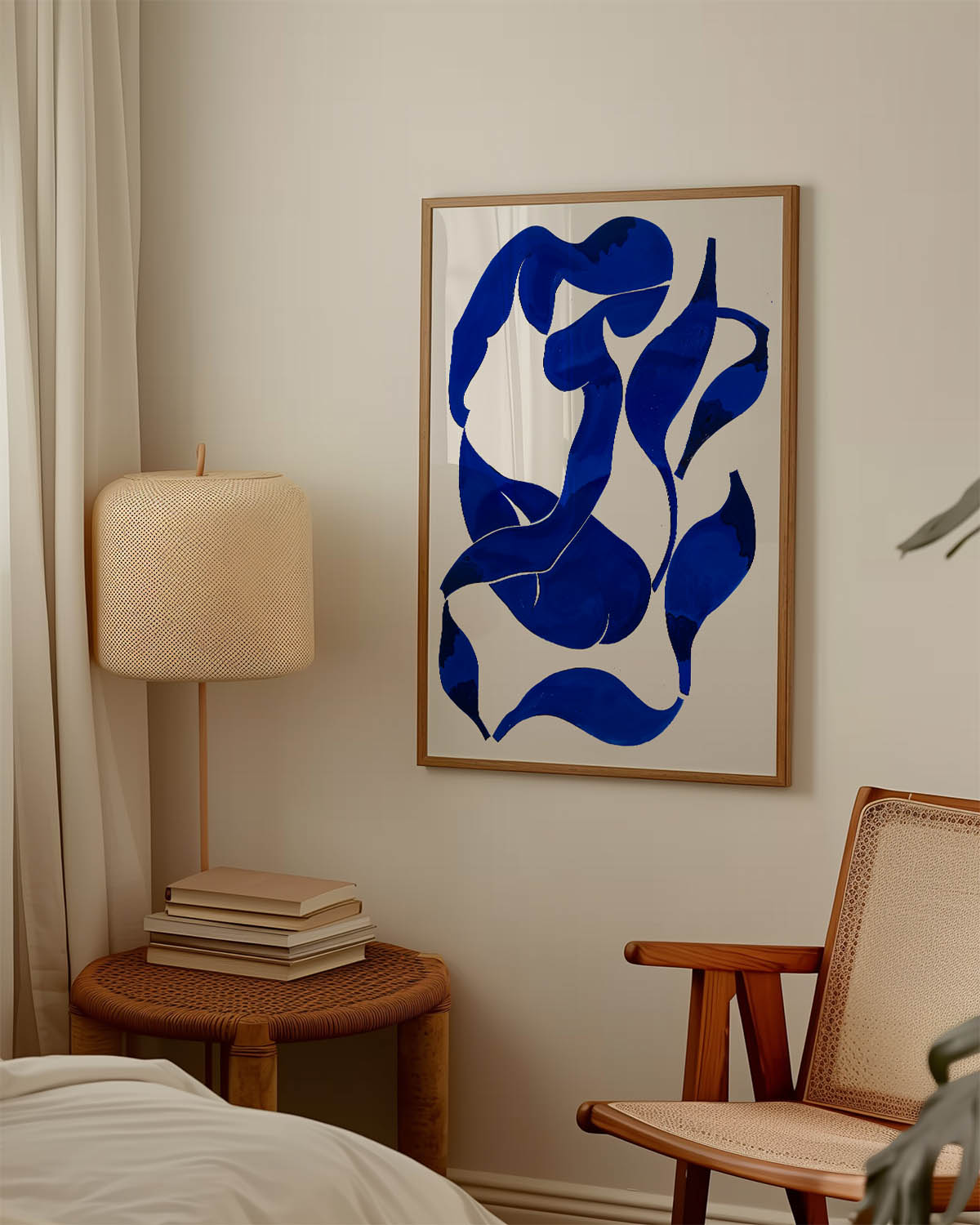 Abstract poster with fluid, curvy shapes in deep blue against a light background.