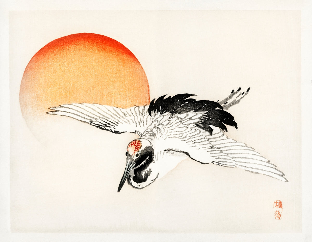 Japanese woodblock print of a red-crowned crane flying in front of a glowing red-orange sun on a soft white background.