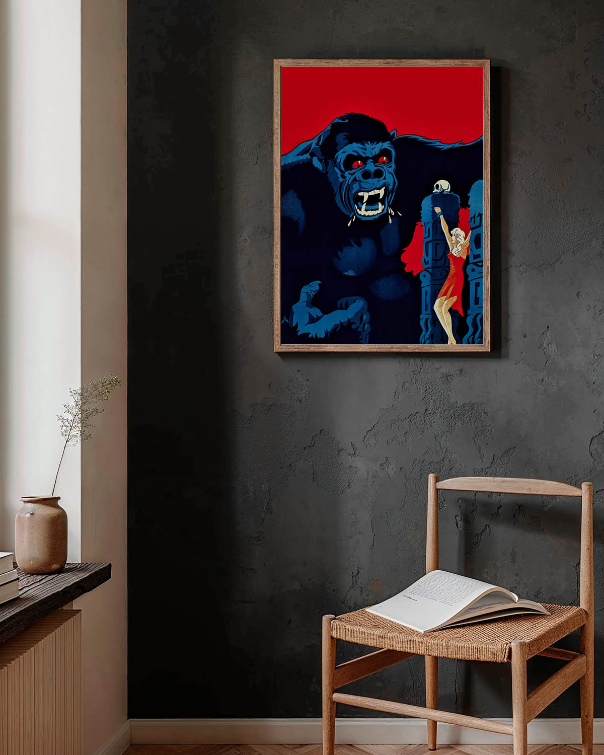 Vintage 1933 King Kong movie poster for the Danish release, featuring a large gorilla with red eyes looming behind a silhouette of a woman in a red dress.