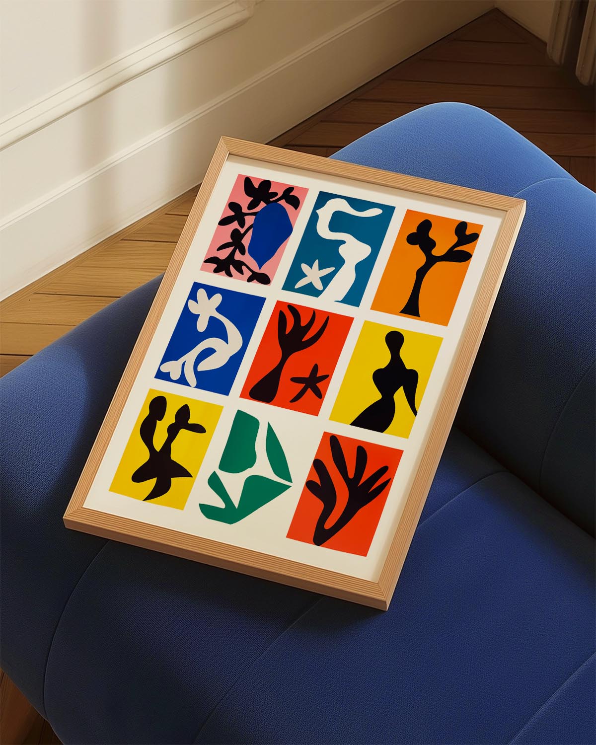 Abstract art poster featuring nine colorful panels with bold, organic cut-out designs in various shapes and vibrant colors.