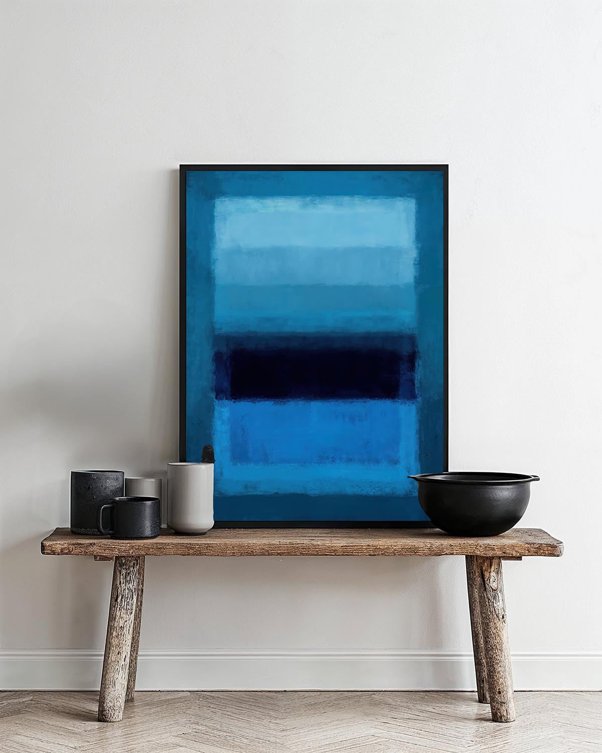 Abstract poster with layered blue tones and a dark horizontal stripe.

