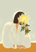 Minimalist illustration titled The Chrysanthemum by Arty Guava, featuring a faceless woman with dark hair holding a large yellow chrysanthemum in front of her face, set against a muted sage background.