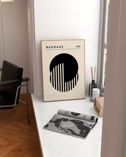 Bauhaus-inspired modern poster showcasing a black half-circle with vertical white stripes on a beige background with the text 'BAUHAUS 1919' at the top.