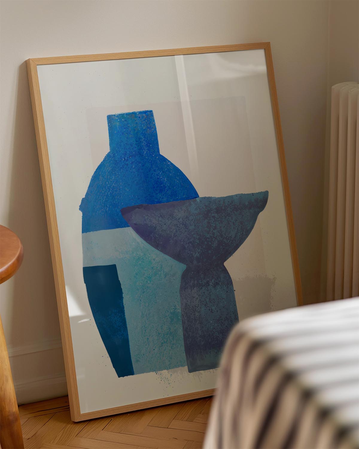 Abstract art poster depicting two stylized blue vases with textured details, set against a neutral background, embodying modern elegance and simplicity.