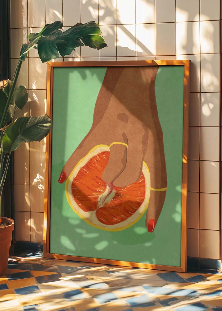 Illustration titled Fruitlover by Raissa Oltmanns, showing a hand with red nails and gold rings gripping a halved orange in a suggestive gesture, set against a textured green background.