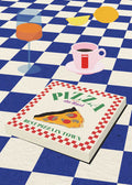 Illustrated poster featuring a pizza box labeled "Best Pizza in Town" on a blue-checkered tablecloth, with a pink coffee cup, orange drink, lemon slice, and orange adding a retro diner vibe.