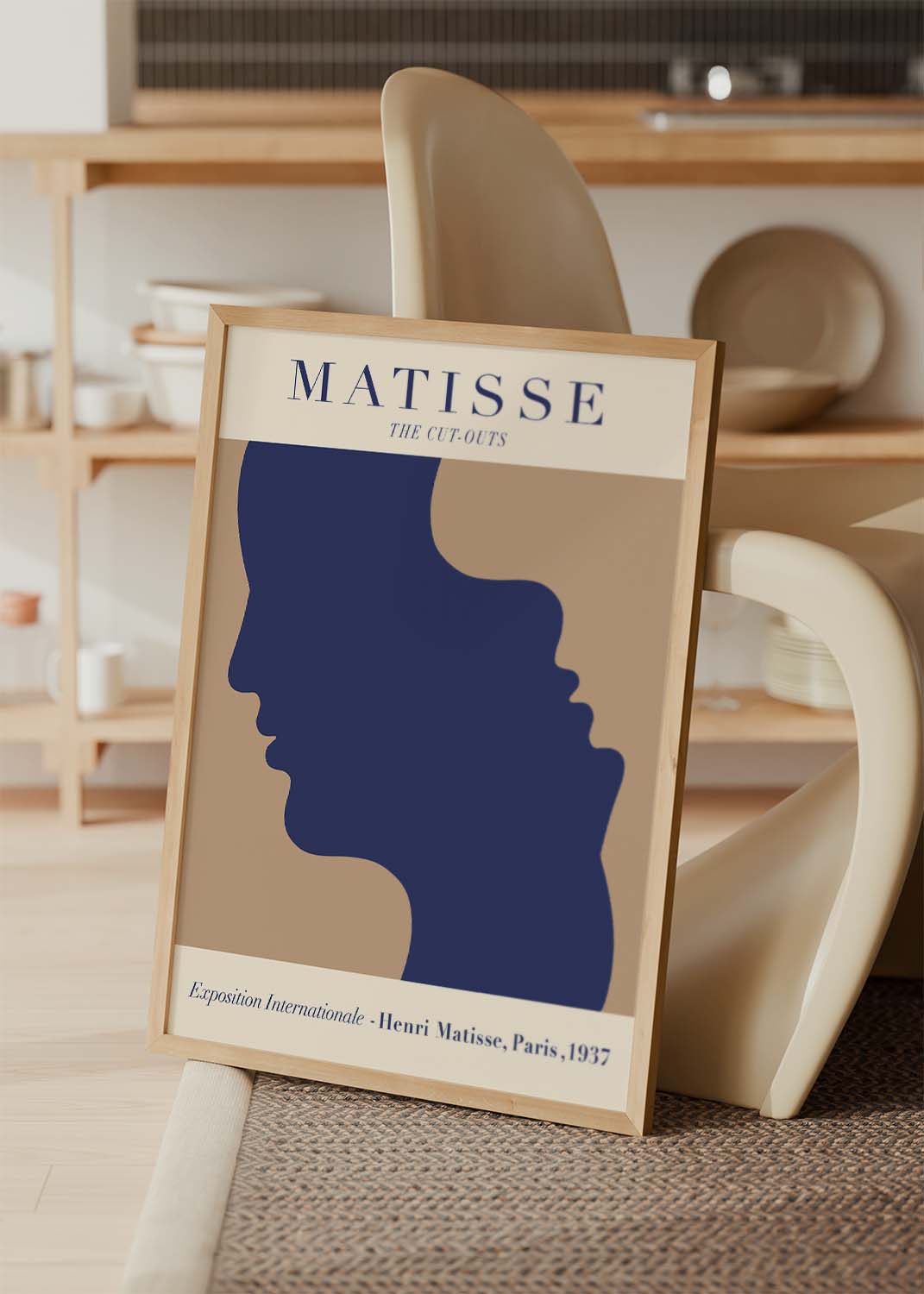 Henri Matisse The Cut-Outs poster showing abstract navy silhouettes on beige background, inspired by his Paris 1937 exhibition.