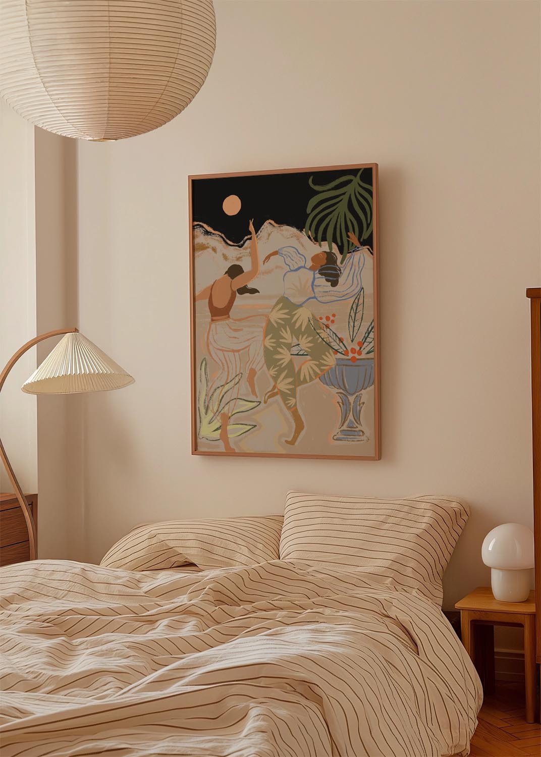 Illustration of two women dancing barefoot under a peach-colored full moon, set against a desert mountain backdrop with tropical plants and abstract details.