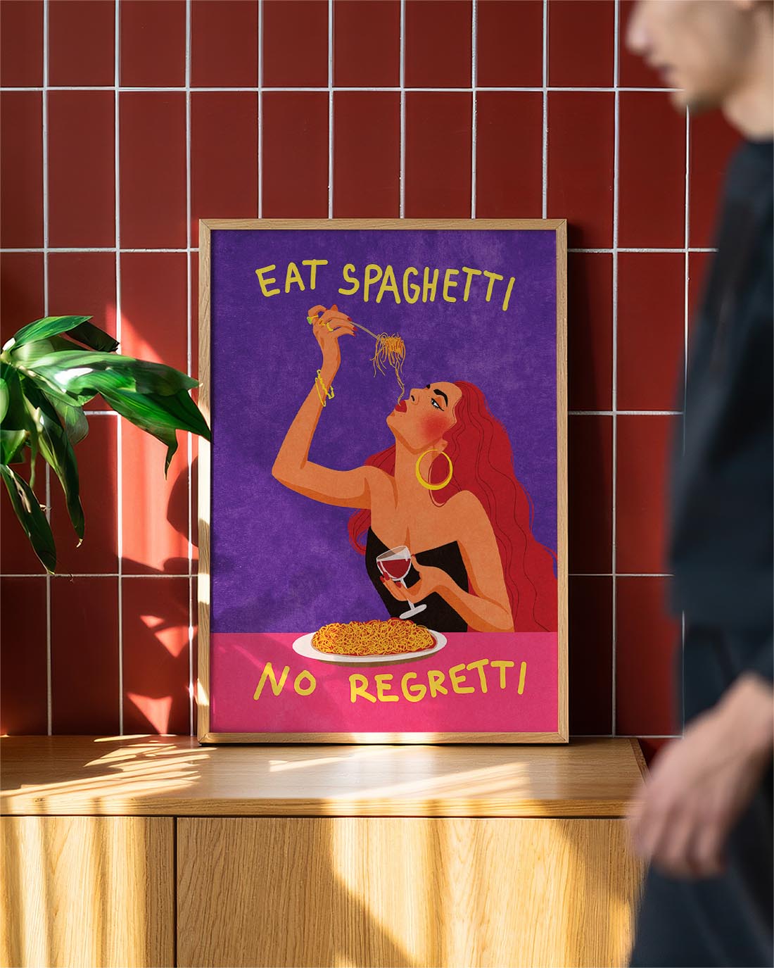 Colorful pop art poster of a stylish woman eating spaghetti and holding a glass of wine, with the phrase "Eat Spaghetti, No Regretti" on a purple and pink background.