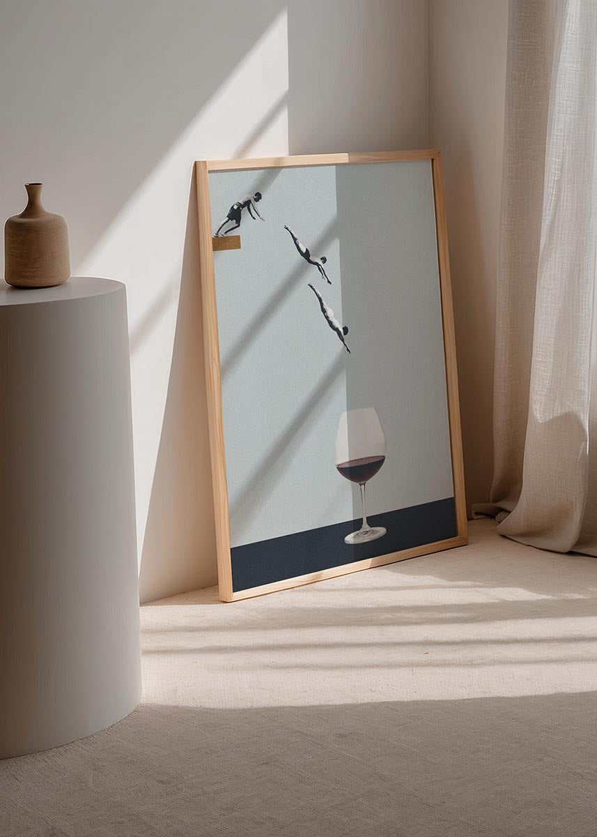 A surreal collage-style poster by Maarten Léon showing a man diving in stages toward a glass of red wine, set against a minimalist light grey background.